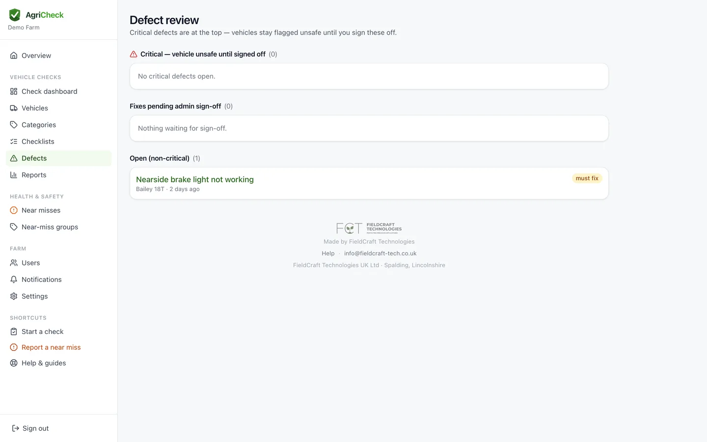 The admin Defects page listing an open fault waiting to be fixed and signed off